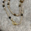 Tiger's eye stone extended sweater chain Pearl necklace tassel necklace natural, niche, high-end, exquisite, fashionable and versatile collarbone chain for women Item Picture